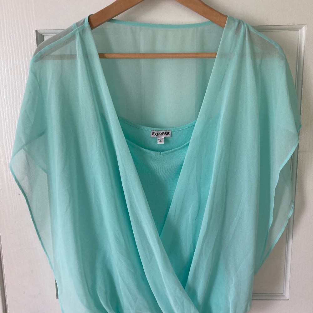 Blue blouse with sheer overlay